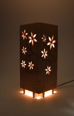 Laser cut and etched light